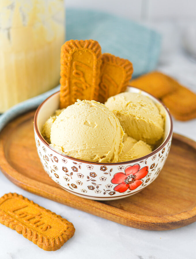 A bowl of Ninja Creami Biscoff Ice Cream with two Biscoff cookies sticking out of the rich, creamy ice cream.